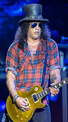 Slash (Saul Hudson) with a guitar