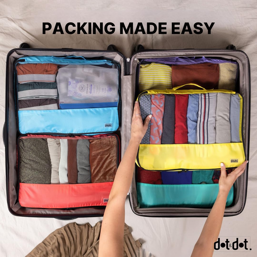 A person packing a suitcase