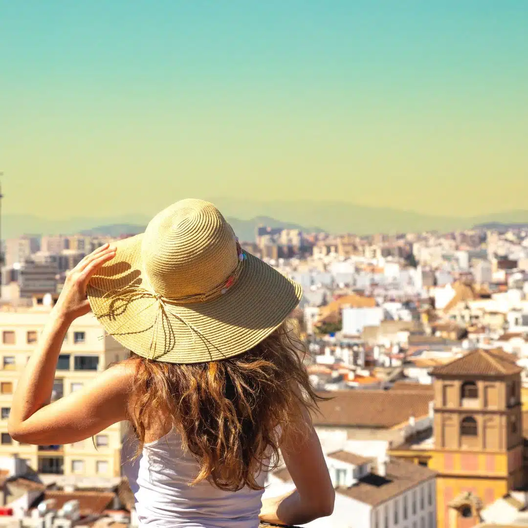 A woman looking over a city