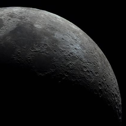 Close-up shot of the moon, with its craters visible.