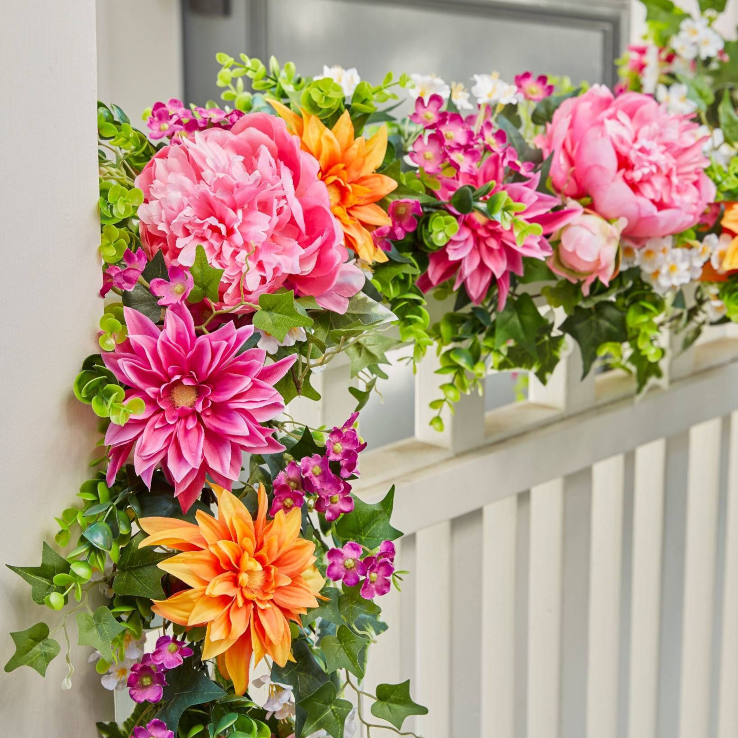 Faux outdoors creeper with green stems and flowers of pink shades